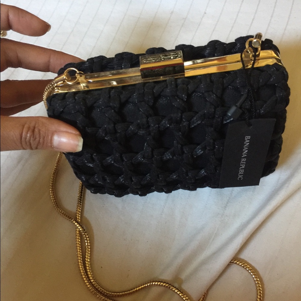 Evening bag in black woven fabric
